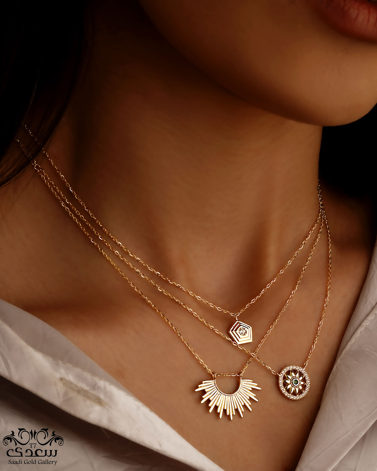 A WOMAN WHO IS WEARIG NECKLACES