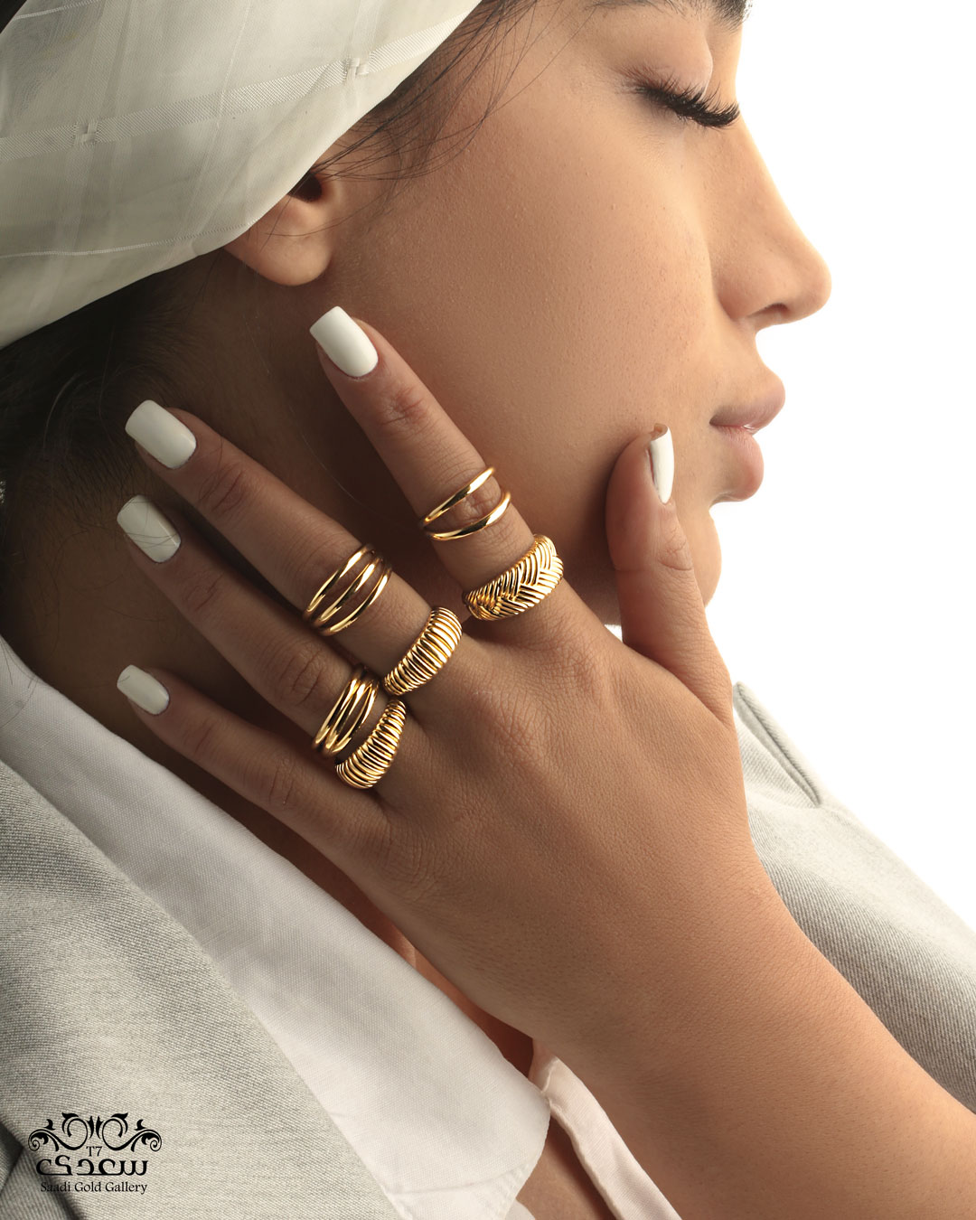 a woman and some rings on her fingers